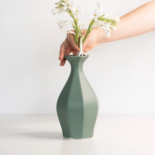 https://www.madetrade.com/cdn/shop/products/porcelain-table-flower-vase-vases-the-bright-angle-rosemary-green-376225_600x.jpg?v=1674147348
